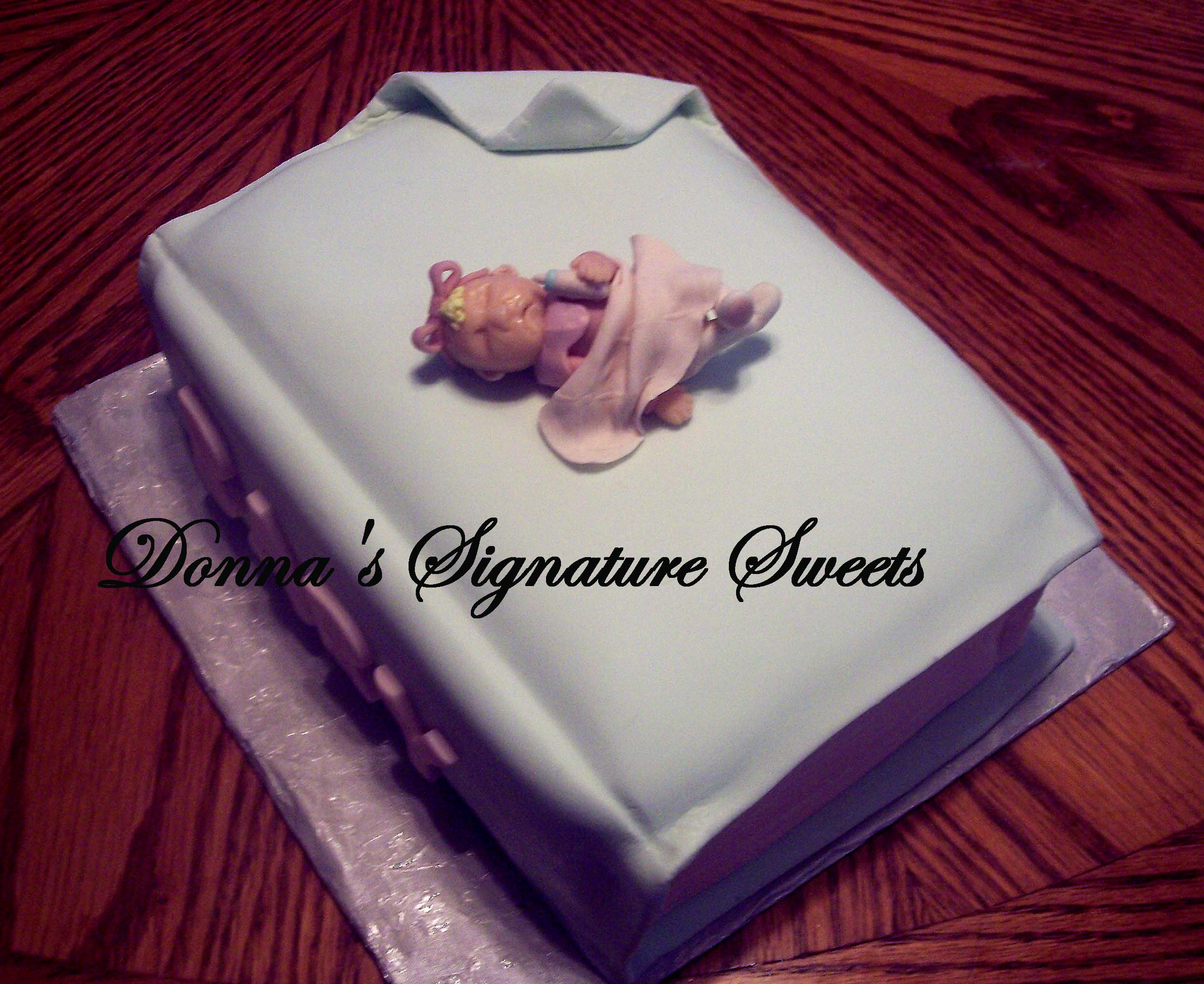 this is a cake that i created for a baby shower i always love